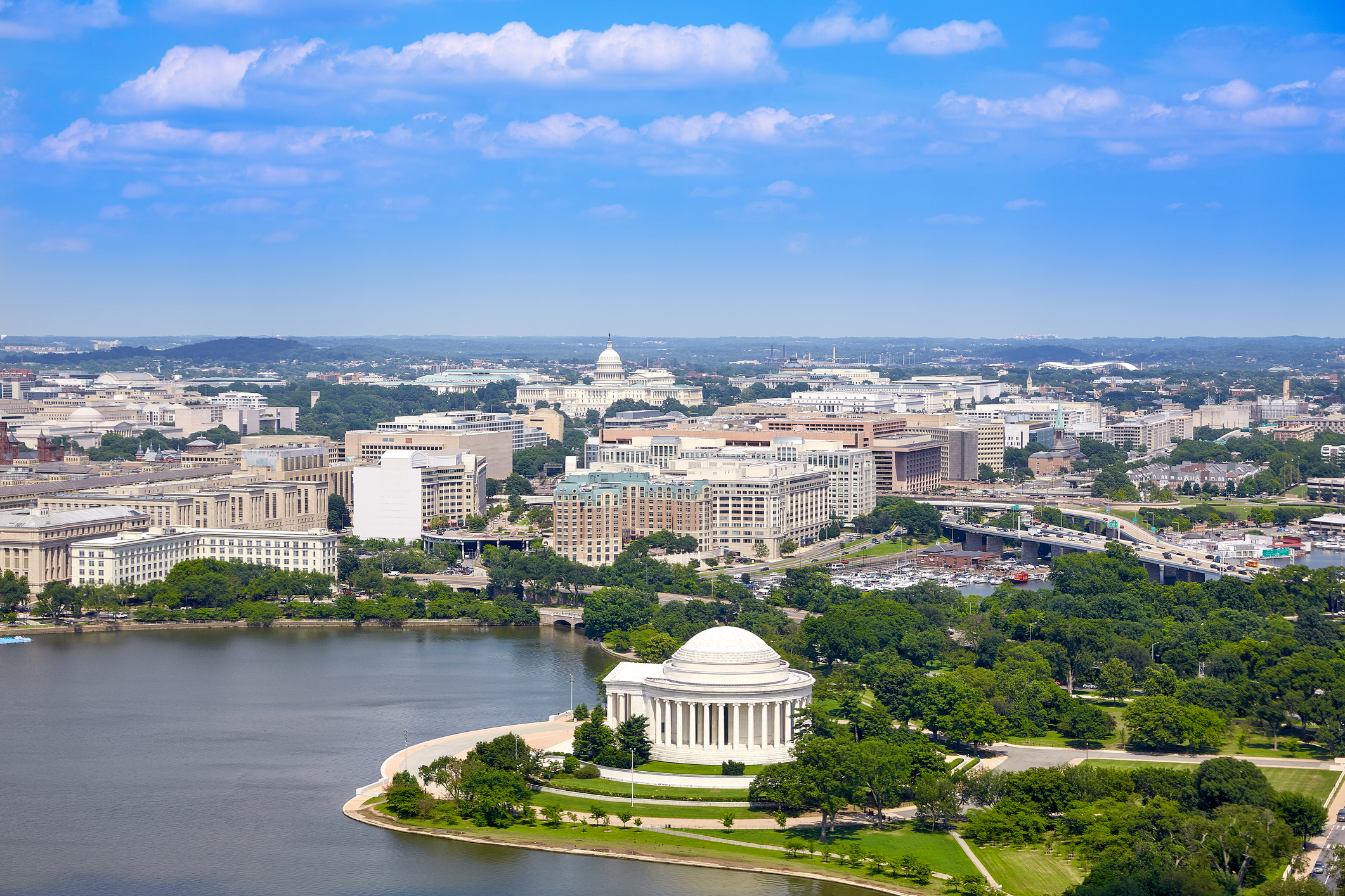 View of the Jefferson Memorial and U.S. Capitol in Washington, D.C., surrounded by the Tidal Basin
