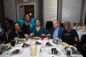 Mary Davila celebrates her 2 Million Mile Safe Driving Award with friends and colleagues at a special recognition dinner hosted by Peter Pan Bus Lines.