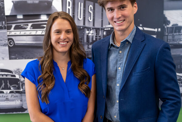 Lauryn Picknelly-DuBois and Peter B. Picknelly of Peter Pan Bus Lines standing together at company headquarters, representing fourth-generation family leadership.