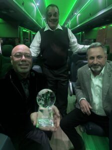 Tony Wilson celebrates winning ABA 2025 Driver of the Year with the Peter Pan Bus Lines Former Vice President of Corporate Relations, Frank Farrow & Current Vice President of Safety, Christopher Crean.